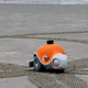 Imagen para el artículo titulado Dibuja algo en tu smartphone, y este robot lo reproducirá sobre la arena